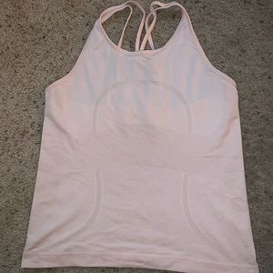 lululemon light salmon pink scuba tank with cross back.